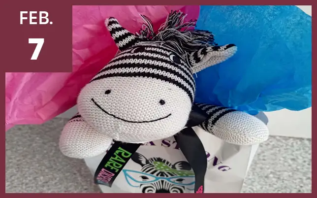 Rare Disease Day zebra mascot with the text 