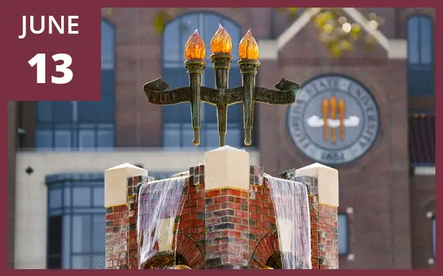 A three-torch sculpture sits atop a brick fountain, with the Florida State University seal and campus buildings in the background. A maroon box in the top-left corner displays the text 