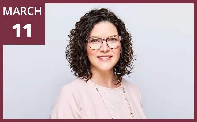 A smiling woman with dark curly hair and glasses is pictured next to a maroon box that reads 